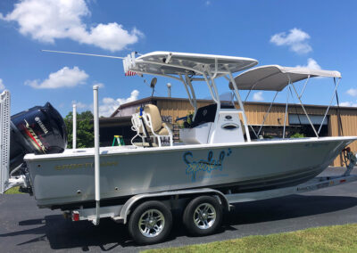 boat with custom canopy in front