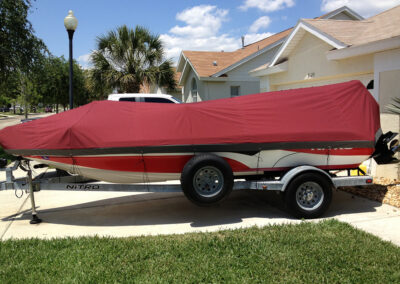 boat with custom red canvas cover 2