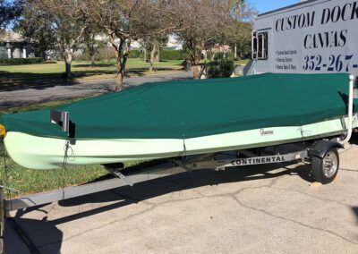 green custom boat canvas cover