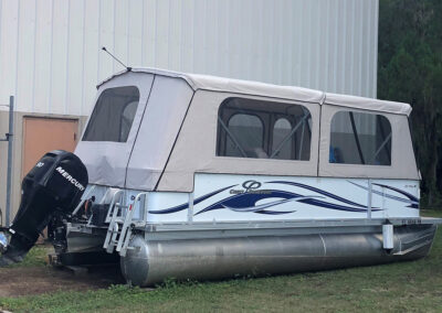 pontoon boat with custom cover canopy with windows